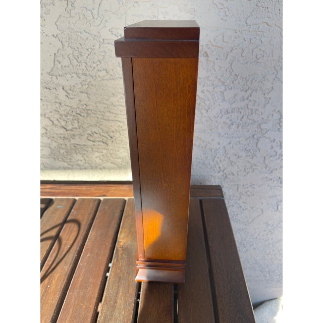 The clock in the image is a Bulova Frank Lloyd Wright Willits Mantel Clock (model B1839). Its design is an adaptation of...