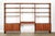 This impressive vintage Danish mid-century modern Model RY100 three-bay wall unit or bookcase was designed by Hans J....