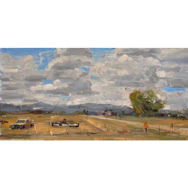 On a Plain by Clyde Steadman | Oil Painting of a rural landscape with clouds and vehicles For Sale