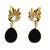 A dramatic pair of vintage Italian 18K gold, onyx, and diamond drop earrings showcasing the bold elegance of late 20th-...