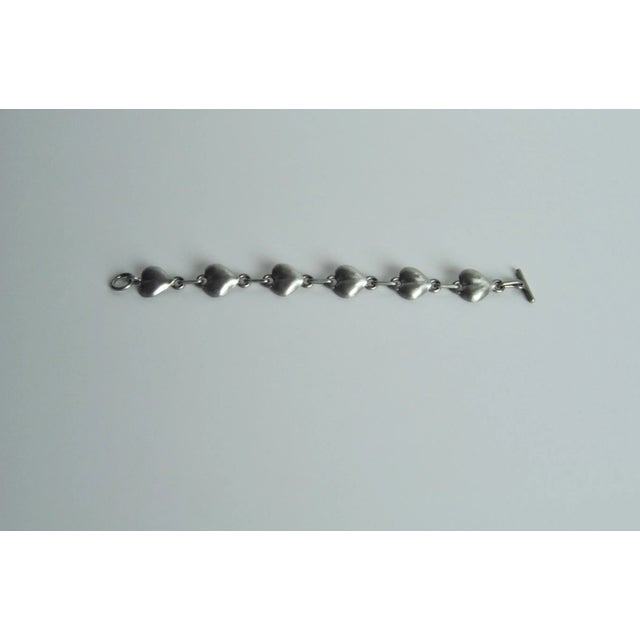 Danish modernist vintage pewter bracelet. The bracelet features a fine minimalistic design. Stamped: design FLINK TIN,...