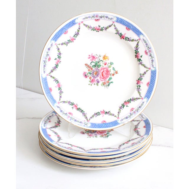 Set of six antique English Ovington Bros serving plates, hand decorated with elegant floral swags and gold rims. Hand-...
