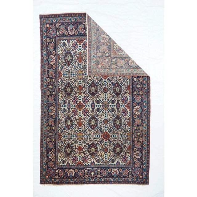 This slit tapestry, woolen weft-faced flat scatter shows a Kurdish version of the popular allover Herati design of dark...