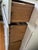 This antique German chest of drawers is a beautiful piece that boasts early-century handmade craftsmanship. Comes with the...