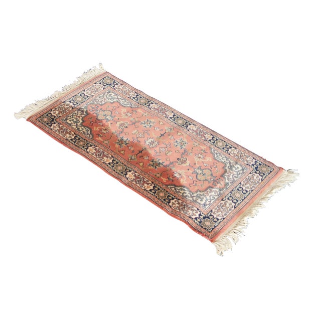 Vintage 100% wool area rug / door mat featuring a floral rose geometric repeating pattern with red field and black border....