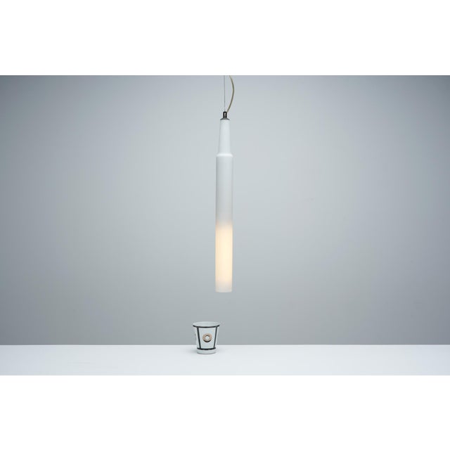 Vintage Candela Pendant Light by Michele De Lucchi, 2000, in Very Good conditions. Designed from 2000 This piece has an...