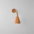 Designed by Nory Mae Parry, the Cone 002 Wall Lamp is a study in restraint. Pencil reed rattan is placed with precision to...