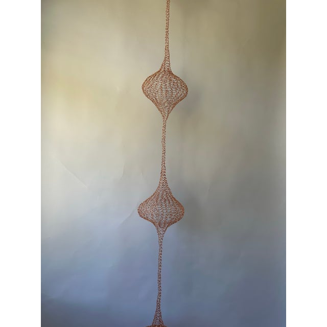 Handmade Copper wire sculpture inspired by the handwoven technique of Ruth Asawa.
