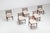 A distinctive set of six dining chairs by Erling Torvits, produced by Sørø Stolefabrik in Denmark during the 1960s....