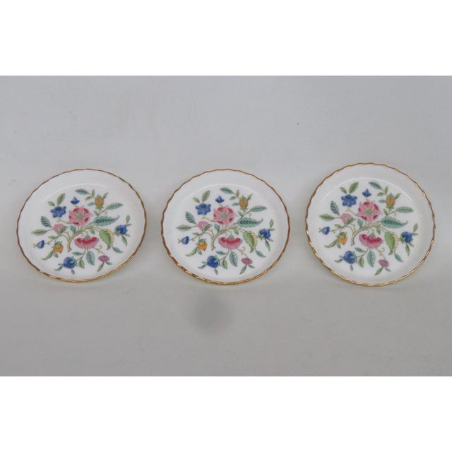 This lovely Set of 3 Small Dishes is made of bone china. Each dish is stamped as follows; "Haddon Hall | Minton Founded in...