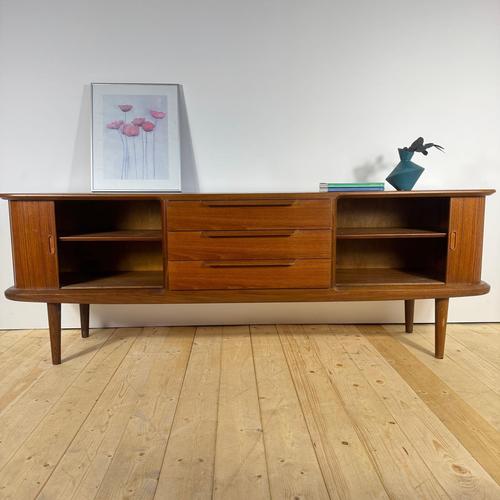 Wood Mid-Century Scandinavian Teak Sideboard with Rounded Edges and Retractable Doors For Sale - Image 7 of 14