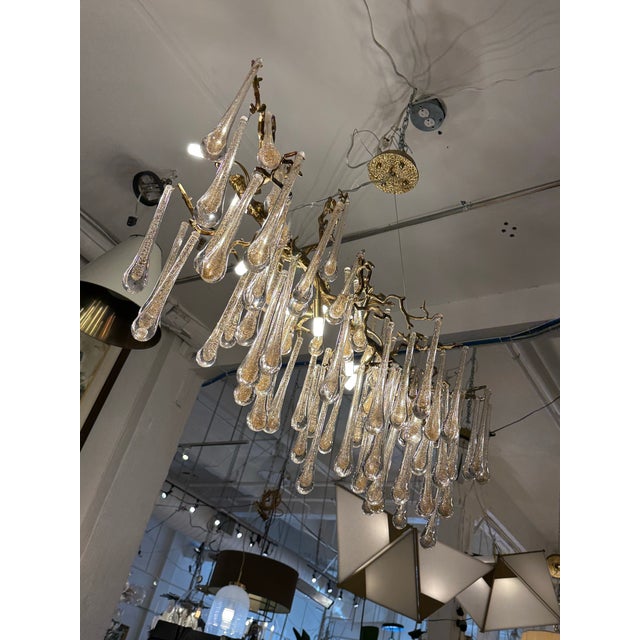 Design Plus Gallery presents a Branch Form Gilt Metal + Glass Droplets Chandelier. A branching gilt metal armature...