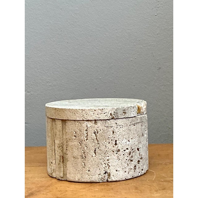 This vintage Italian coquina stone box beautifully showcases the timeless appeal of natural materials and understated...
