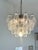 Contemporary Chandelier with transparent “POLIEDRI” in Venini style. Glass elements are blown inside a wooden mold from...