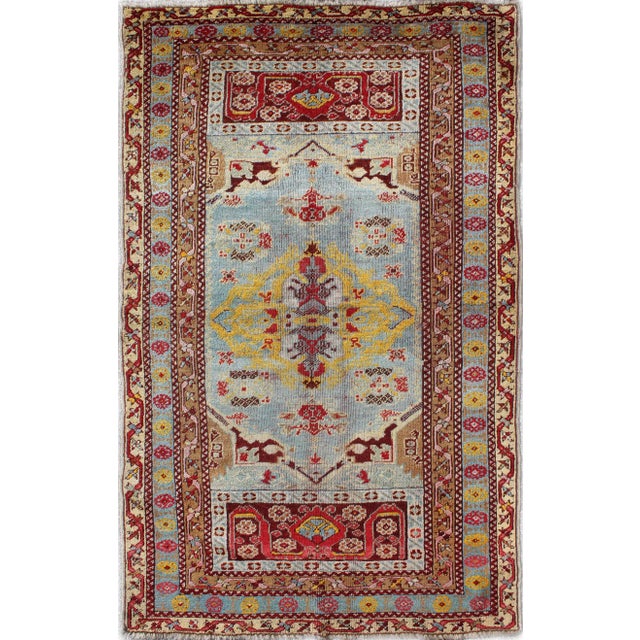 Antique Turkish Oushak Rug in Light Blue Background and Border For Sale