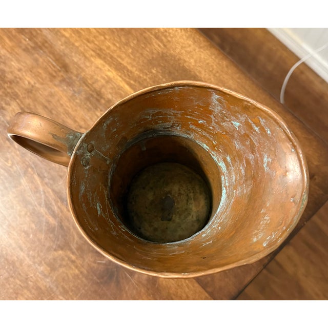 While primarily used for decorative purpose today, such pitchers historically served as functional vessels for serving...