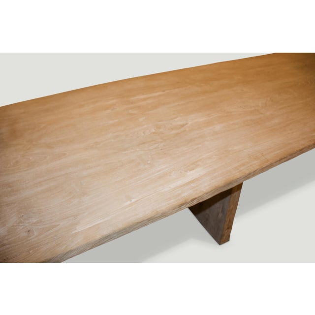 Reclaimed teak dining table comprising of four 1.5″ slabs joined. We added a light white wash finish allowing the grain of...