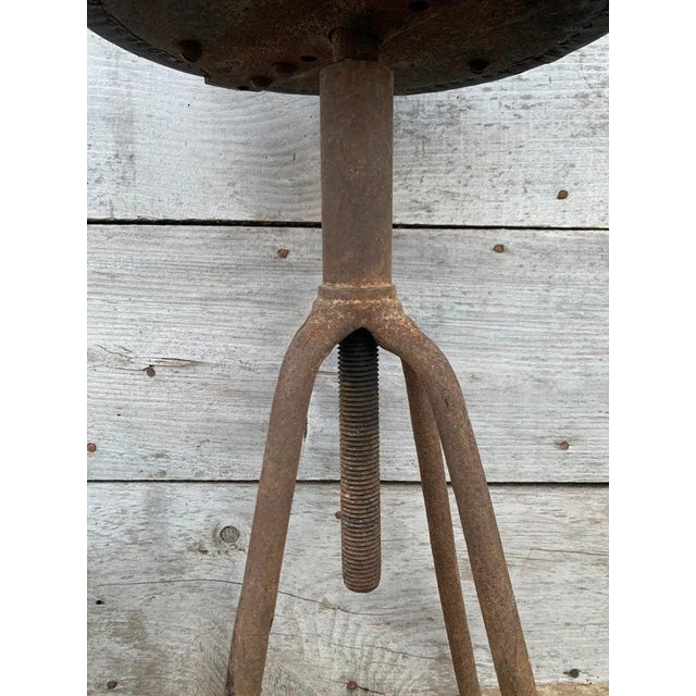 Vintage French Industrial Adjustable Stool | 1930s Iron Swivel Stool with Black Leather Seat Bring authentic European...
