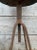 Vintage French Industrial Adjustable Stool | 1930s Iron Swivel Stool with Black Leather Seat Bring authentic European...