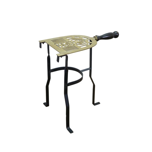 Antique Georgians style pierced / reticulated brass and iron hearth trivet. Popularized during the 18th and 19th centuries...