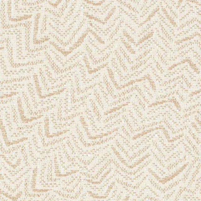 This small-scale, abstract jacquard weave features a multi-directional pattern that reads like a neutral, making it a...