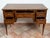 An antique Neapolitan Louis XVI centerpiece desk made of walnut burl, dating from the second half of the 18th century. The...