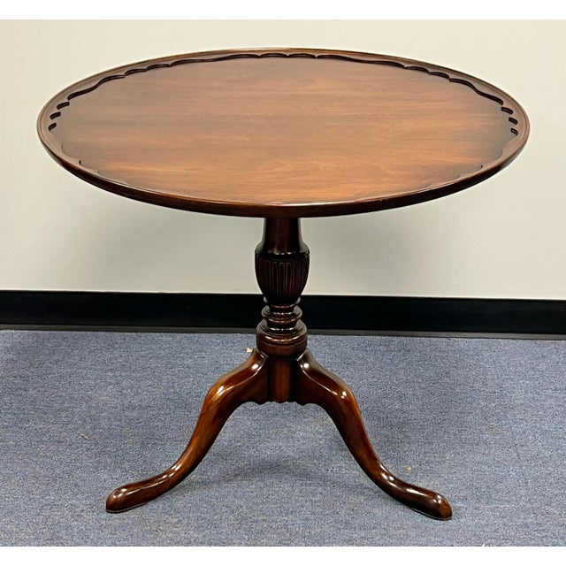 Beautiful Queen Anne style mahogany tea table by Brandt of Hagerstown Maryland. Well done carved pie crust top, with a...