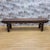 Antique Shanxi Province Bench Antique bench from Shanxi, featuring a long rectangular top with carved scrolling motifs and...
