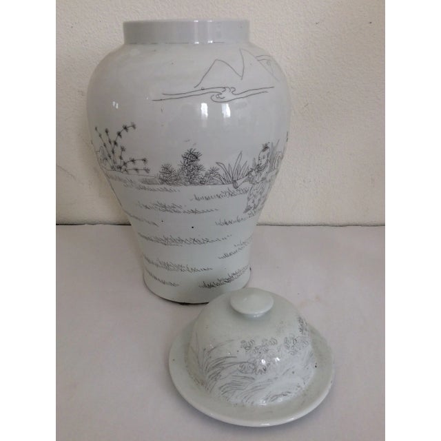 This Asian Temple Jar makes a statement! It features etched scenes of children, clouds and mountains. It is a large piece...