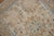 A fine quality mat size Persian Kashan rug with a fancy formal motif in ivory, beige, brown, and blue, circa 1950....