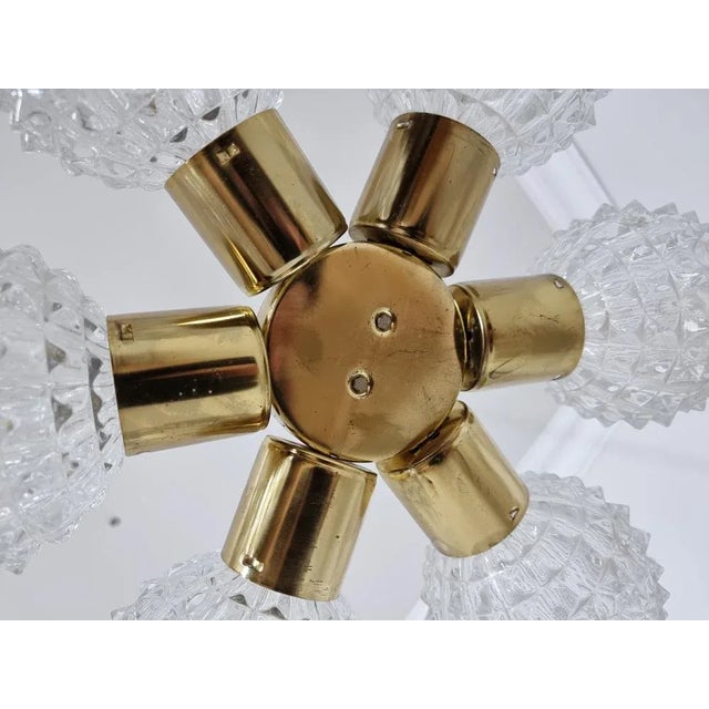 Chandelier in Cut Glass from Kamenický Šenov, in Good conditions. Designed 1970 to 1979 This piece is attributed to the...