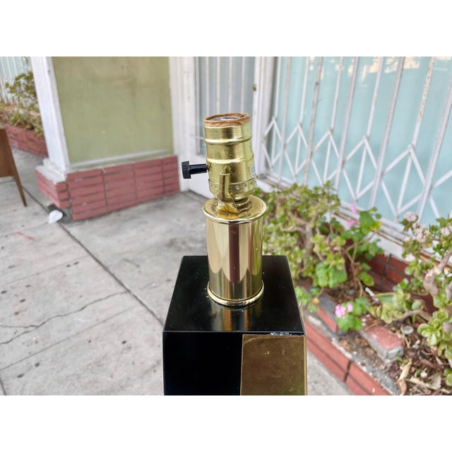 ✨ Vintage Hollywood Regency in Brass & Black ✨ This 1970s American Brass Floor Lamp is a striking example of mid-century...