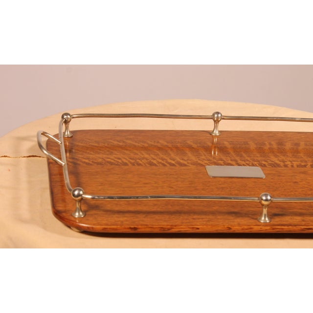Exquisite 19th-century English silver-plated and oak tray A beautiful rectangular piece with two handles Superb oak with a...