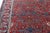 This early 20th-century Persian Tehran rug is a paragon of Persian craft. The rich red field carries an allover trellis of...