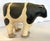 Sweet artisan crafted folk art style cow soft sculpture. She is made of canvas stuffed and sewn like a pillow, and painted...