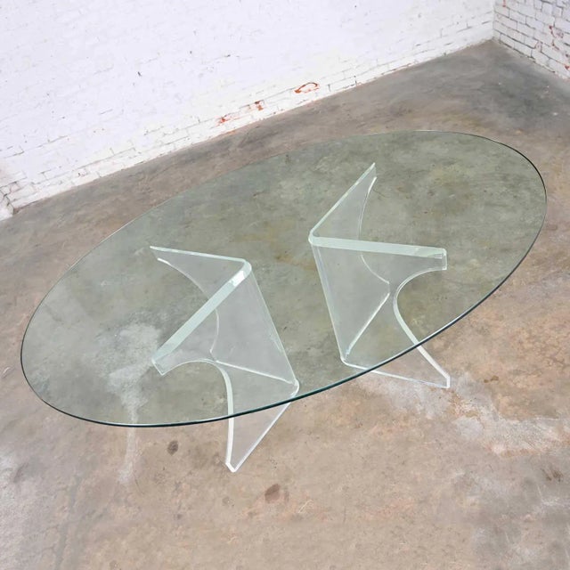 Gorgeous vintage modern Lucite sculptural dining table with oval shaped glass top. Beautiful condition, keeping in mind...
