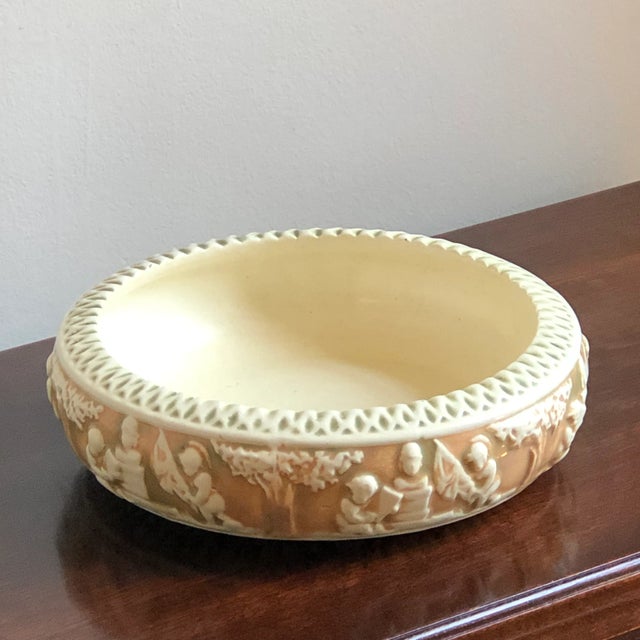 Offering an antique Roseville Donatello centerpiece bowl, circa 1916. This beautiful classical-style bowl, featuring...