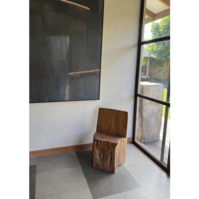 This remarkable chair is a one-of-a-kind piece, masterfully crafted from an old rice mortar repurposed into functional...