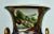 A 20th century pair of deep blue and gold hand painted gilt sieve vases with painted landscape scenes and gilt serpentine...