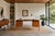 Danish modern teak executive desk manufactured by G.V. Mobler in Denmark during the 1960s. Showcasing the refined...