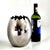 Offered is a chic and sleek yet whimsical polished stainless steel "Ovo" egg shaped vase/ice bucket made by Mepra in...