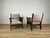 Pair of armchairs with a finely crafted wooden frame and pink boucle upholstery, made in Italy in the 1940s. The armchairs...