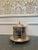 Beautiful English silver plate covered biscuit box/tea caddy with attached footed gallery tray. The Caddy is in good...