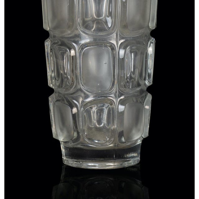 Cylindrical glass vase is a wonderful glass decorative object, realized by an italian manufacture during the 1970s. Very...