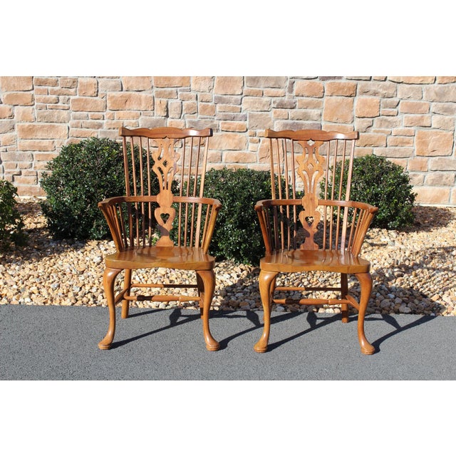 From the Fisher Park Collection by Thomasville, this pair of Windsor armchairs is made from pecan, which has a wonderful...