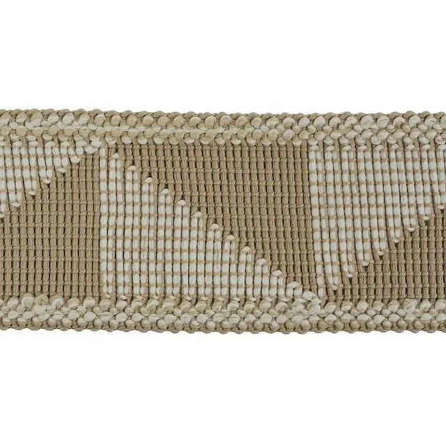 A tribal-esque geometric pattern and thick yarns give this tactile, high-performance finishing touch an artisanal,...