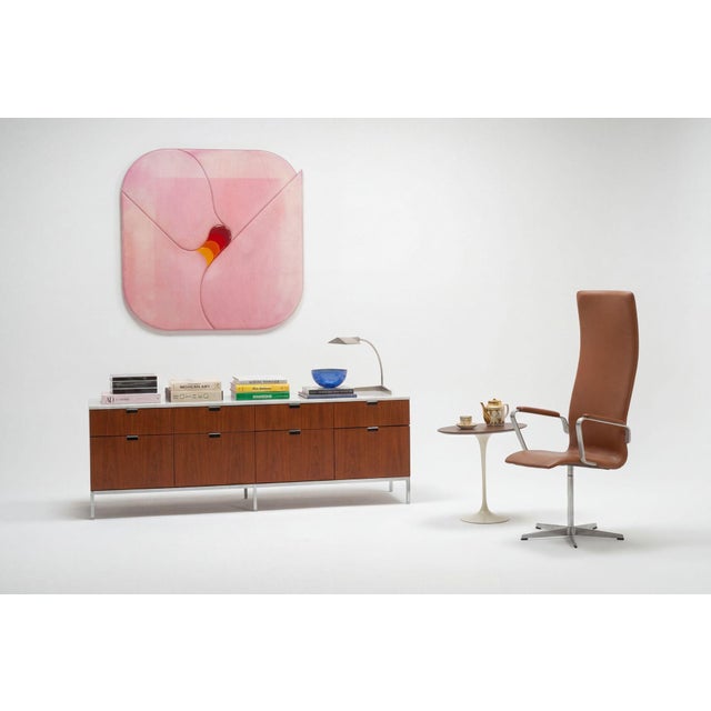 Florence Knoll Eight-Drawer Credenza Teakwood and Marble 1973 This iconic mid-century storage piece features Florence...