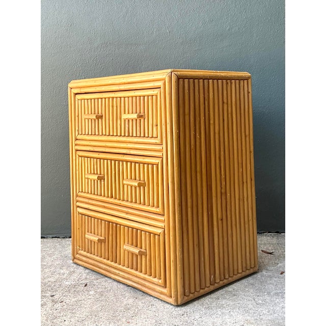 This stunning vintage chest of drawers showcases the timeless appeal of the coastal modern aesthetic, featuring an...