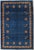 Vintage Hand-knotted Persian Lori Gabbeh rug featuring a deep indigo field with scattered geometric medallions and a...