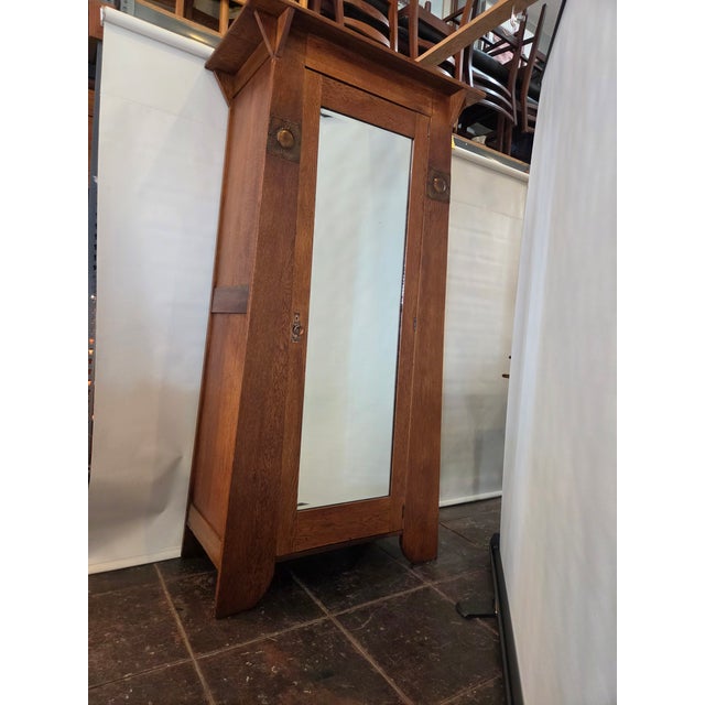 Arts & Crafts Armoire 1900s Oak. Liberty & Company Styling. This is a substantial piece. Nice solid wood and great Arts &...